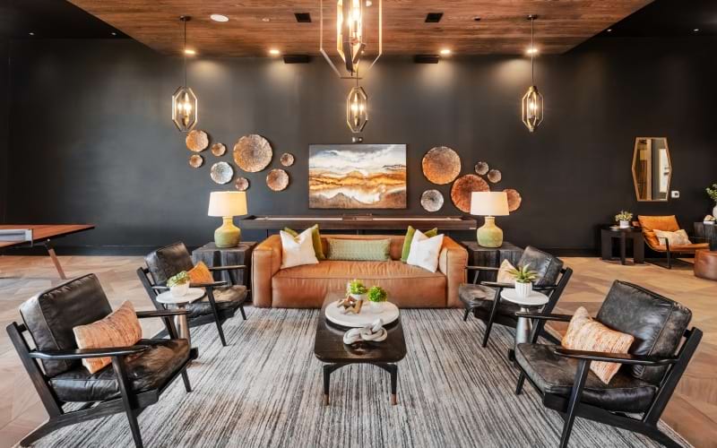 community living space with couches and chairs