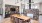 a community kitchen with a table and chairs