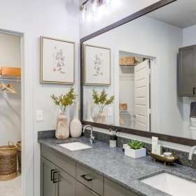 a bathroom with a large mirror